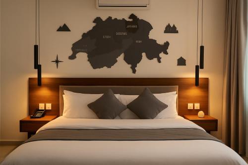 Giường trong phòng chung tại Alpirious