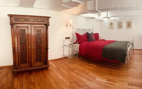 En eller flere senge i et værelse på Schloss Adolphsburg im Sauerland