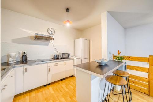 Appartement duplex confortable avec parking et balcon