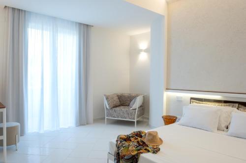 Postel nebo postele na pokoji v ubytování OLIVETO A MARE - Suite & Apartment