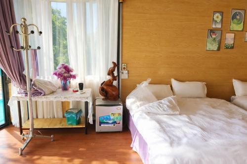 Postel nebo postele na pokoji v ubytování Nà Bó Homestay