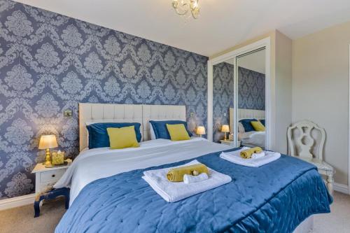 En eller flere senge i et værelse på 3 Bed in Launceston oc-41848