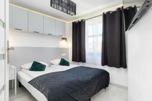 Cosy Apartments with Parking & Balcony by Noclegi Renters
