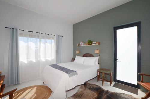 Ένα ή περισσότερα κρεβάτια σε δωμάτιο στο Inge's Overnight