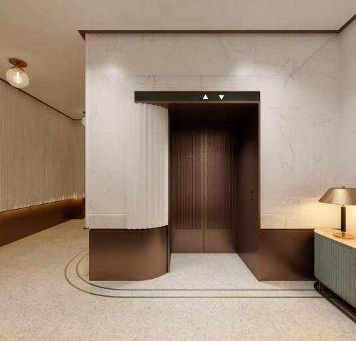 a building with a door with the letter a on it at Grey Parrot Resort Hotel in Chengdu