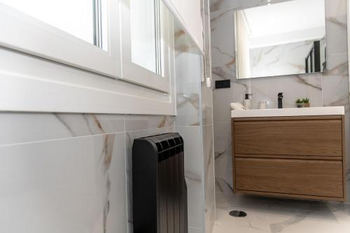 Et badeværelse på TURISCAPITAL Plaza de BALTAR