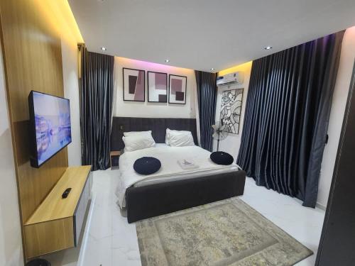 Ένα ή περισσότερα κρεβάτια σε δωμάτιο στο Spacious, Private 3 Bedroom Apartment with Lounge