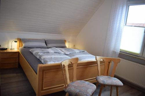 Voodi või voodid majutusasutuse Feriendomizil Wattwurm Paul toas