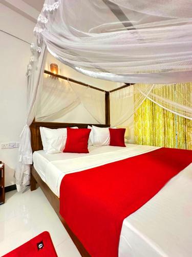 Giường trong phòng chung tại Seagate Villa