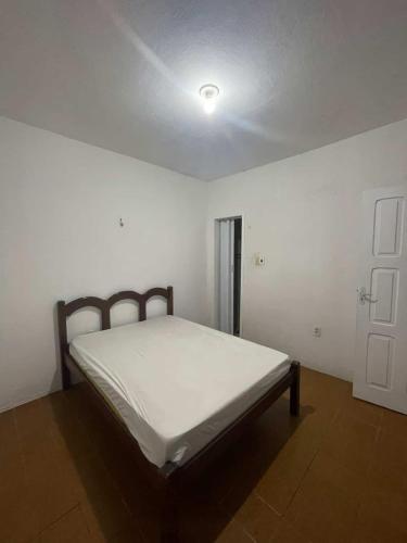 Ένα ή περισσότερα κρεβάτια σε δωμάτιο στο Casa de Praia