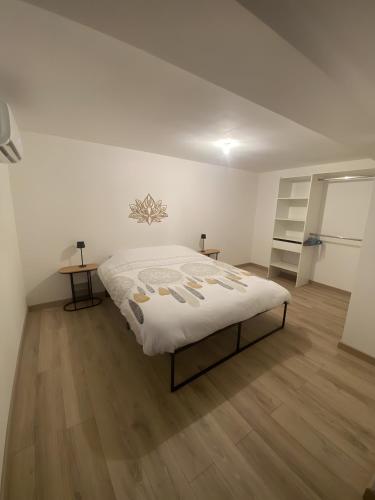 Postel nebo postele na pokoji v ubytování Gîte Brain de nuit