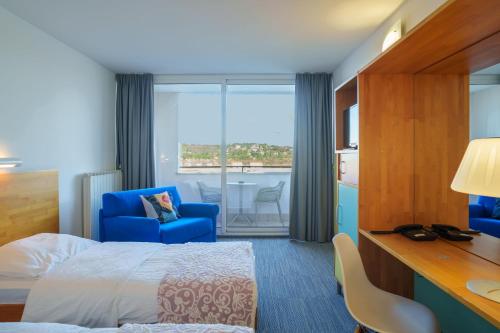 Postel nebo postele na pokoji v ubytování Hotel Oleander - Oleander Resort