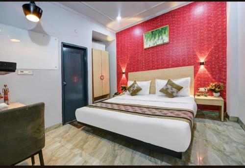 Ένα ή περισσότερα κρεβάτια σε δωμάτιο στο Hotel dev inn