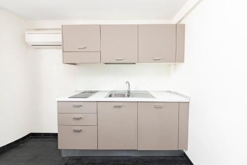 Kuchyň nebo kuchyňský kout v ubytování Ungaretti Resort