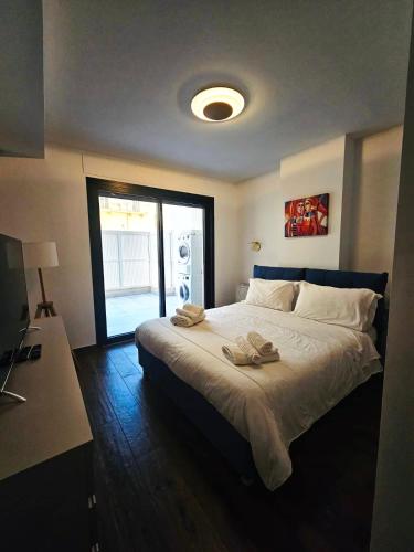 Postel nebo postele na pokoji v ubytování Melo Exclusive Suite 149