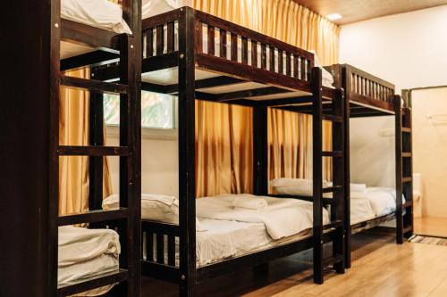 Ένα ή περισσότερα κρεβάτια σε δωμάτιο στο Èden Ember Castle