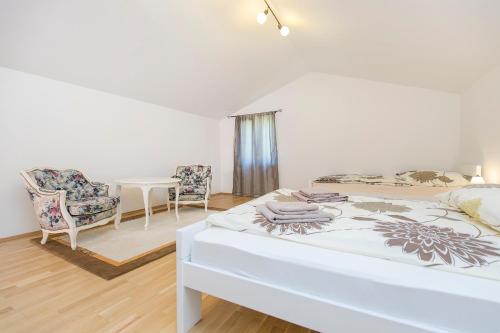 En eller flere senge i et værelse på Haus in Istrien direkt am Meer