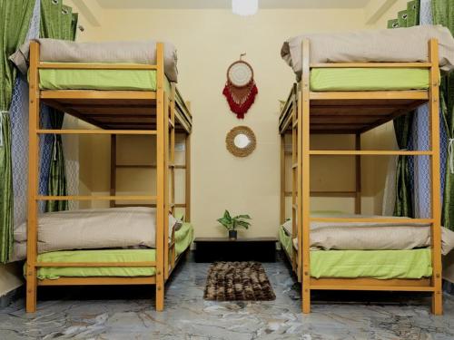 Postel nebo postele na pokoji v ubytování Dakshome