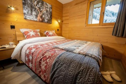 En eller flere senge i et værelse på L'Étoile du Linga