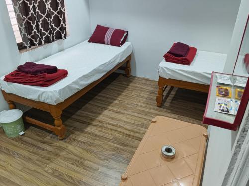 Giường trong phòng chung tại MR Lodge