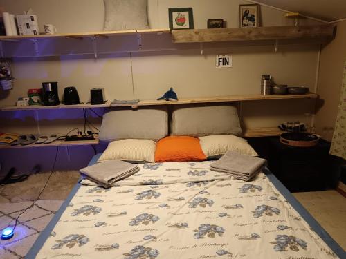 En eller flere senge i et værelse på CityMini Camping