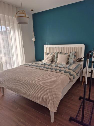 Giường trong phòng chung tại Zira apartman