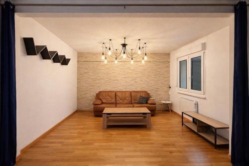 Posezení v ubytování Appartement confortable N1 à Saint-Louis, proche Basel&Allemagne