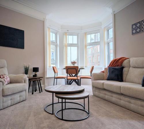 Et opholdsområde på Longrow Apartment