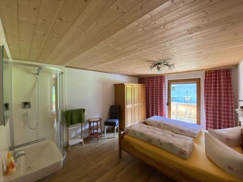 Ένα ή περισσότερα κρεβάτια σε δωμάτιο στο Ferienhaus Beate