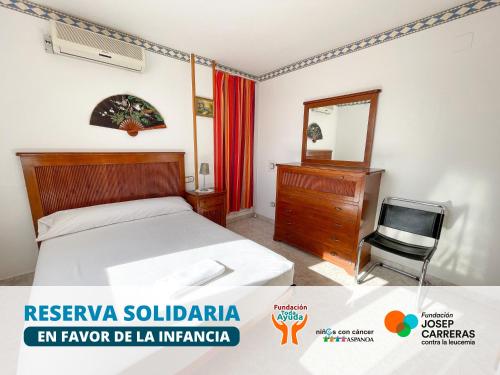 En eller flere senge i et værelse på Apartamentos Costa Azahar 3000