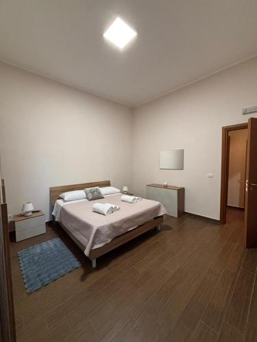 Postel nebo postele na pokoji v ubytování La Fenice Centrale