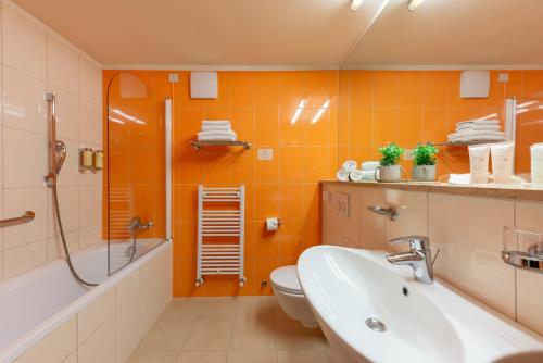 Phòng tắm tại Family Hotel Vespera