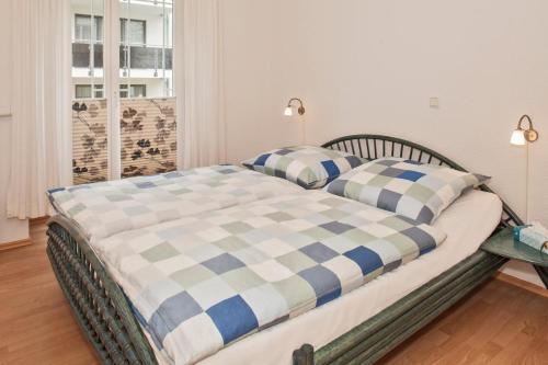 En eller flere senge i et værelse på Strandoase WG Nr 18