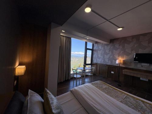 En eller flere senge i et værelse på Cloud Studio by The Erina House