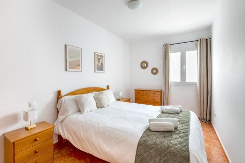 Postel nebo postele na pokoji v ubytování Brisa Marina amplio y luminoso con vistas al mar