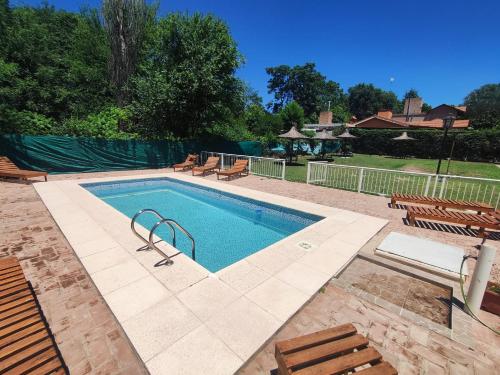 Swimmingpoolen hos eller tæt på Cabañas De Lourdes