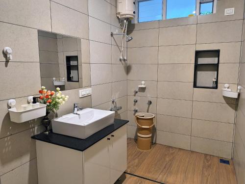 Et badeværelse på Iggu Holiday Home