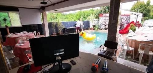 Et tv og/eller underholdning på พิฑารัตน์รีสอร์ท