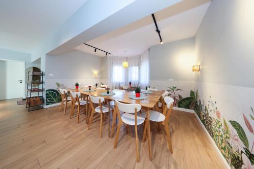 a large dining room with a table and chairs at EPIC Vila Brașov, Cristian in Braşov