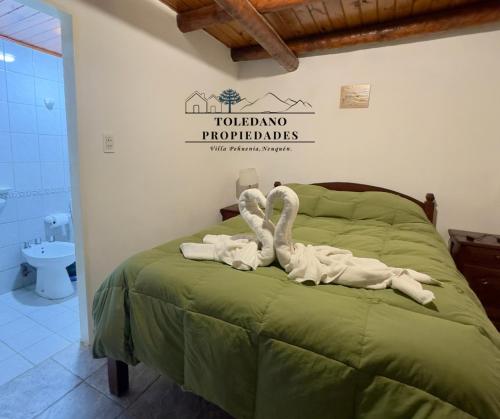 En eller flere senge i et værelse på Aire de Montaña