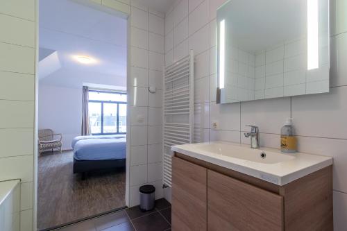 Postel nebo postele na pokoji v ubytování Residence Wijngaerde - Baddomburg