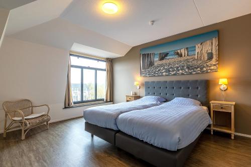 Postel nebo postele na pokoji v ubytování Residence Wijngaerde - Baddomburg