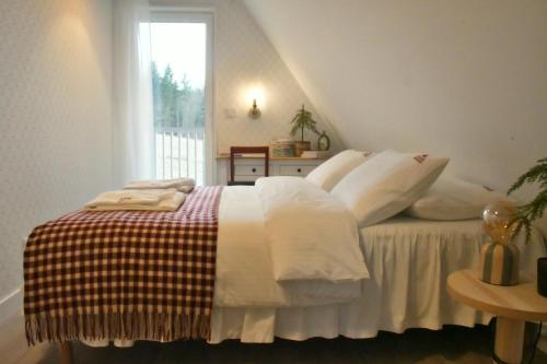 Postel nebo postele na pokoji v ubytování Hygge Beskid