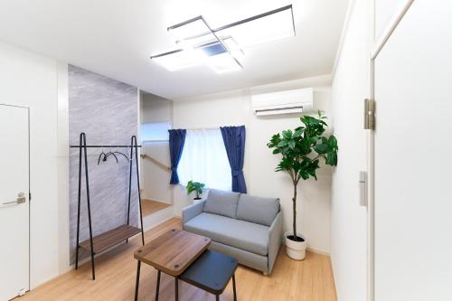 Postel nebo postele na pokoji v ubytování 2025年12月オープンセール 大阪駅まで一駅 フルリノベーション 長期割引有り 最大8人