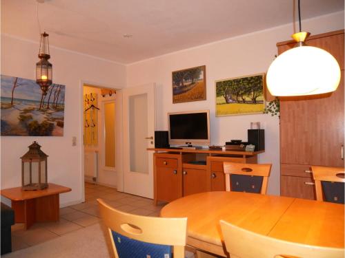 Et tv og/eller underholdning på Haus Roland- Whg 15 mit Schwimmbad und Sauna