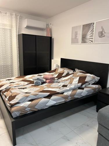 En eller flere senge i et værelse på RiverStone city center