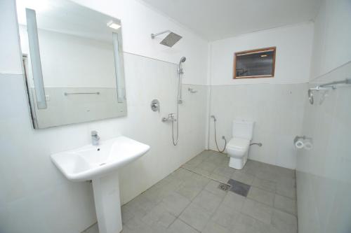 Et badeværelse på Birdsong Leisure Resort