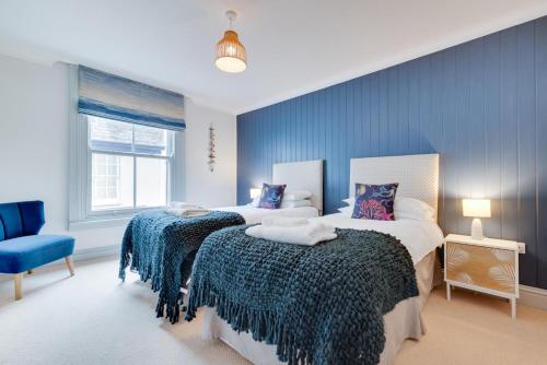 En eller flere senge i et værelse på 2 Bed in Fowey oc-pont