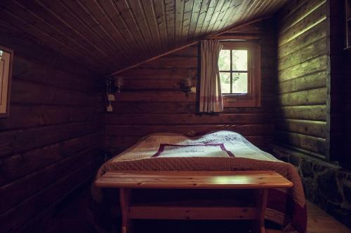 Giường trong phòng chung tại Chalet en Ardennes