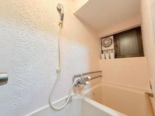 Et badeværelse på Okayama Urban Peach